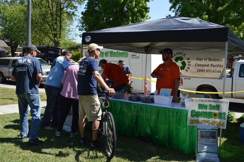Event Participants Visiting a Booth